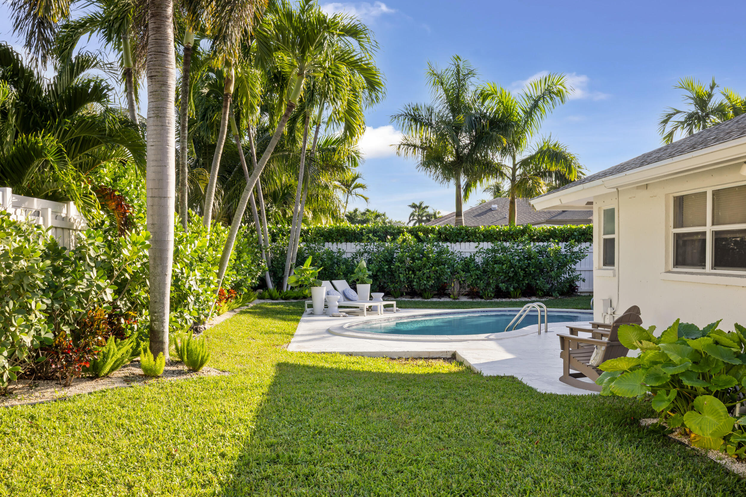 2512 Southwest 5th Street Boynton Beach, FL 33435 - Photo 33 of 37 a view of backyard with swimming pool