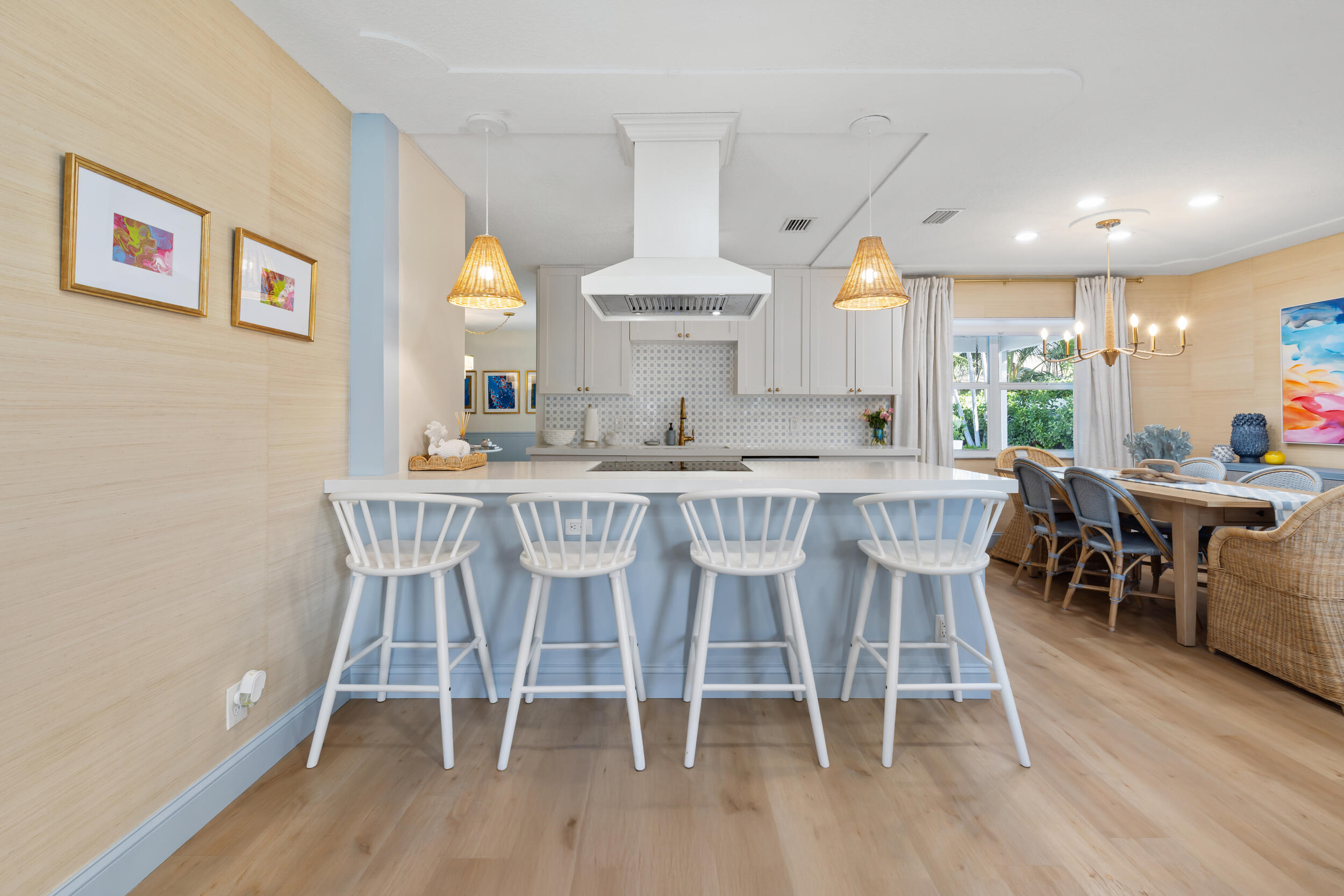 2512 Southwest 5th Street Boynton Beach, FL 33435 - Photo 6 of 37 a dining room with furniture a rug and wooden floor