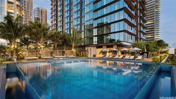 a view of swimming pool with outdoor seating