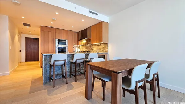 a view of a dining room with furniture