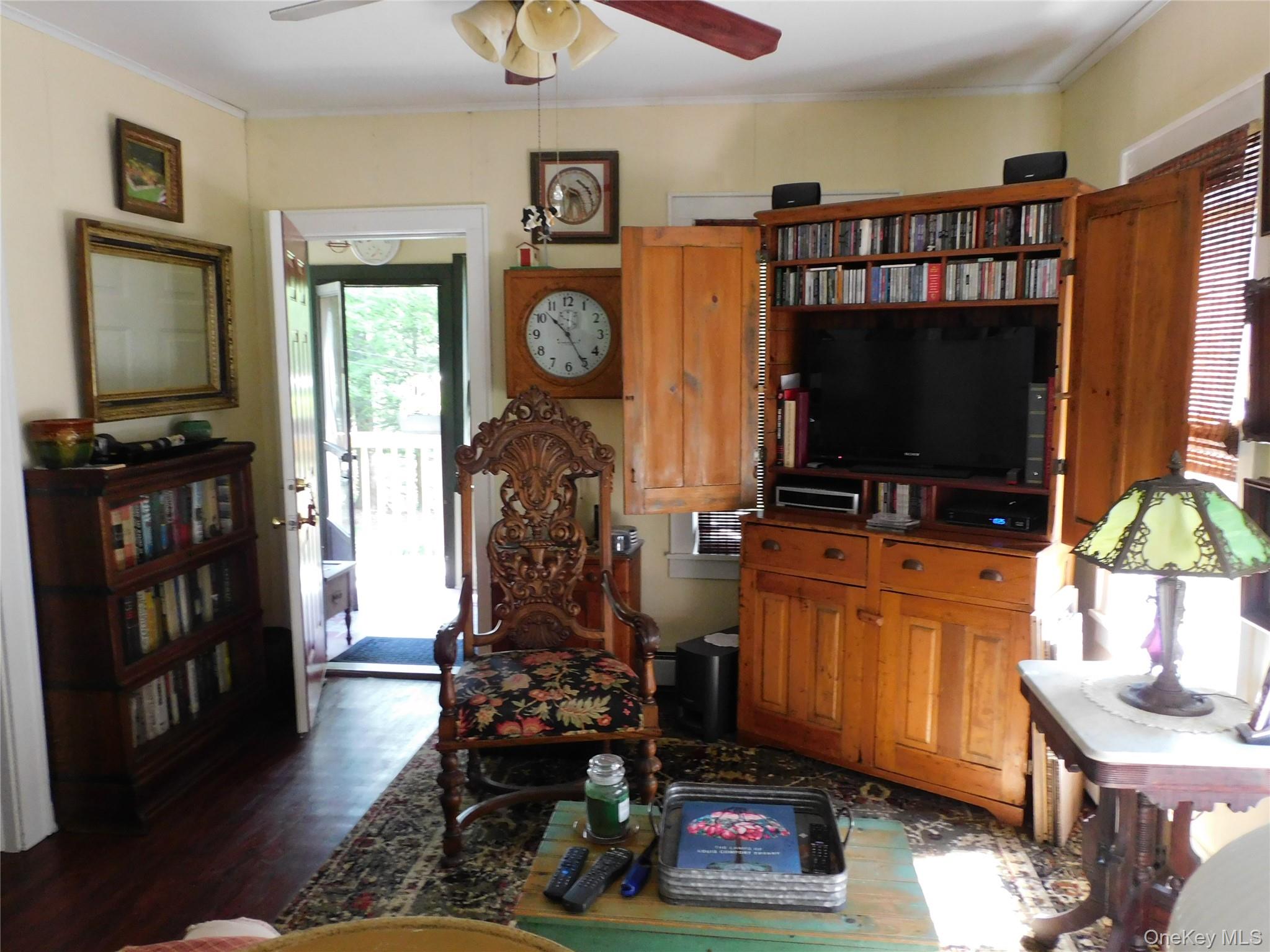18-20 Church Road Mountain Dale, NY 12763 - Photo 15 of 20 a living room with furniture and a flat screen tv