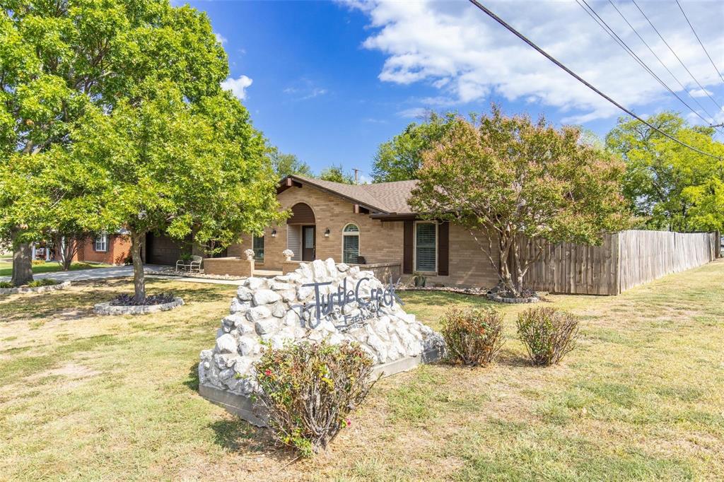 625 Deer Drive Greenville, TX 75402 - Photo 27 of 29 a front view of a house with a yard