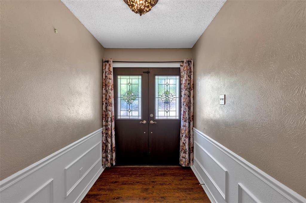 625 Deer Drive Greenville, TX 75402 - Photo 4 of 29 a view of hallway with stairs
