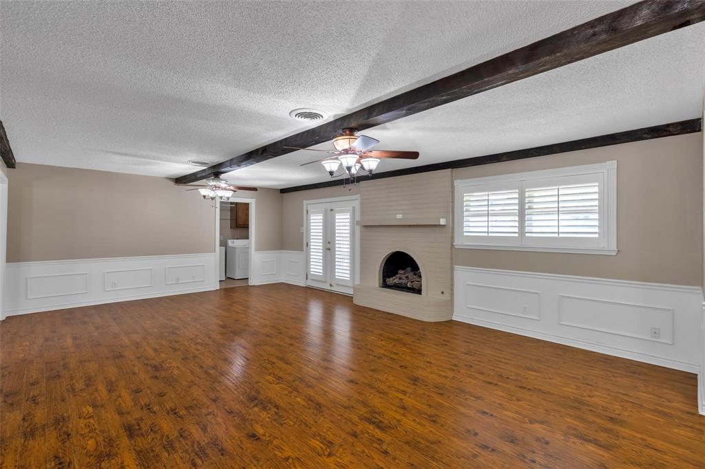 625 Deer Drive Greenville, TX 75402 - Photo 8 of 29 a view of empty room with wooden floor