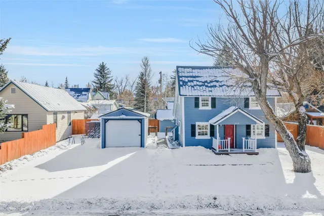 front view of a house with a street