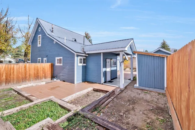 front view of a house with yard