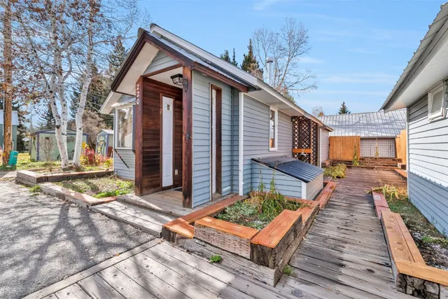 a view of city from balcony with seating space