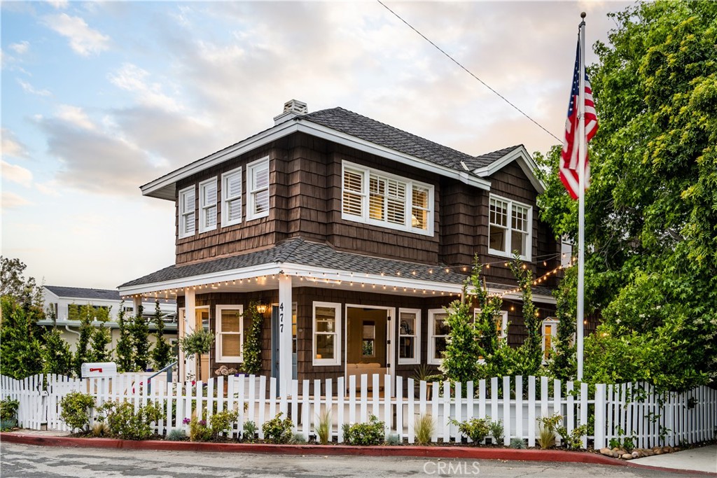 477 33rd Street Manhattan Beach, CA 90266 - Photo 1 of 1 a front view of a house with a garden