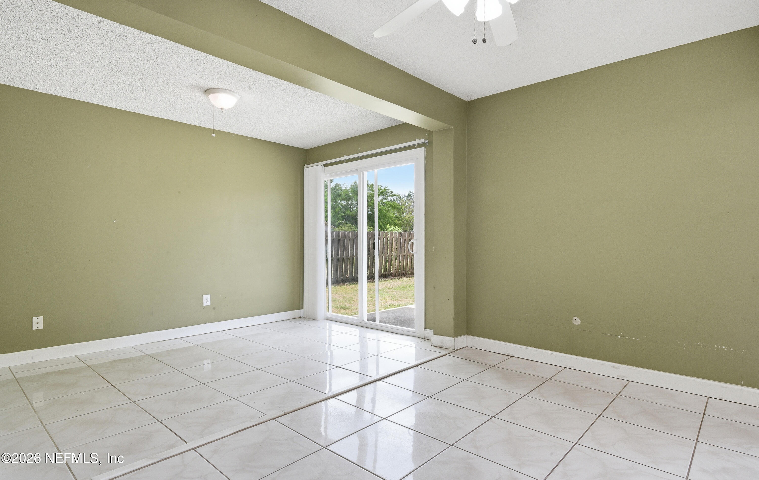 1722 Farm Way Middleburg, FL 32068 - Photo 13 of 37 a view of an empty room with a window