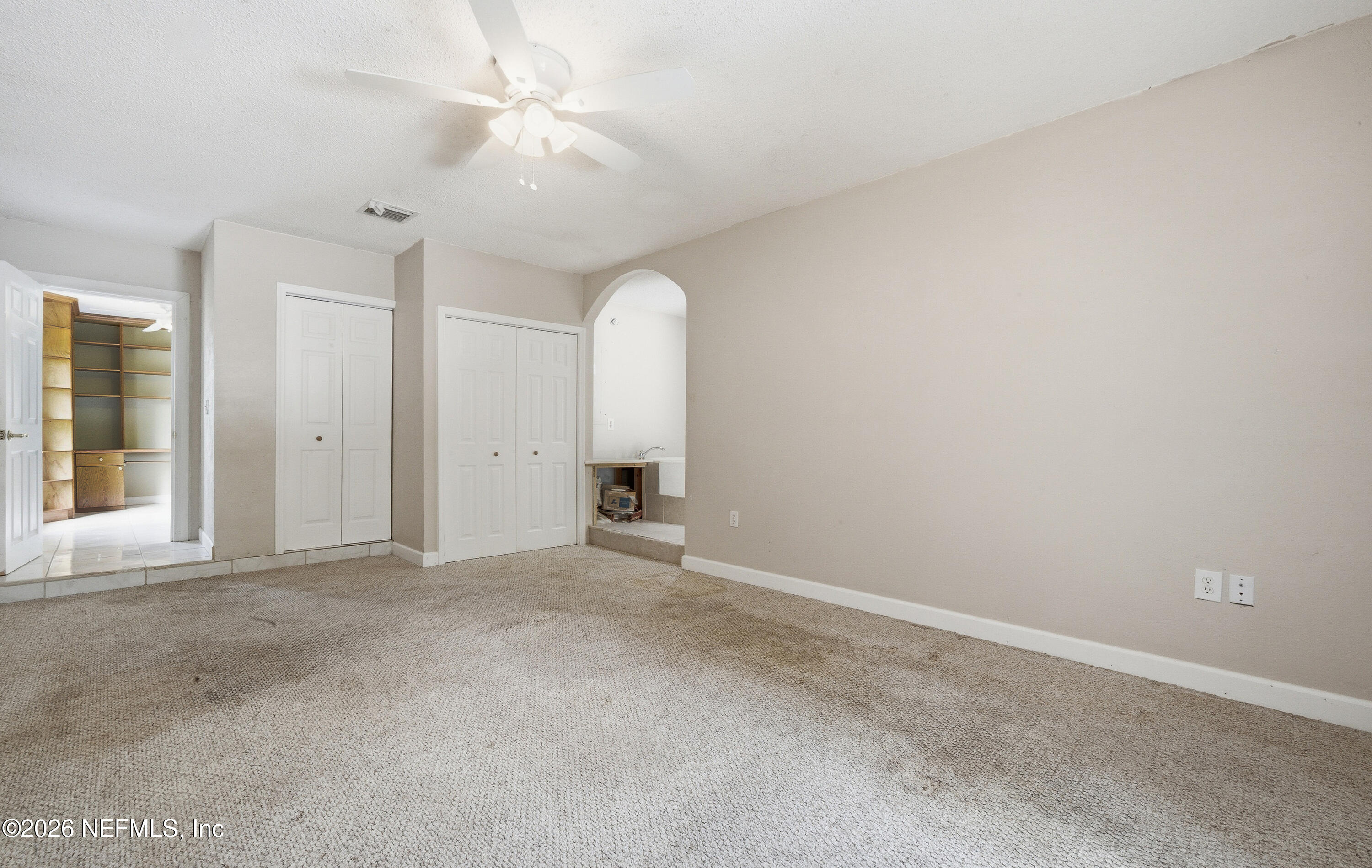 1722 Farm Way Middleburg, FL 32068 - Photo 19 of 37 an empty room with chandelier fan