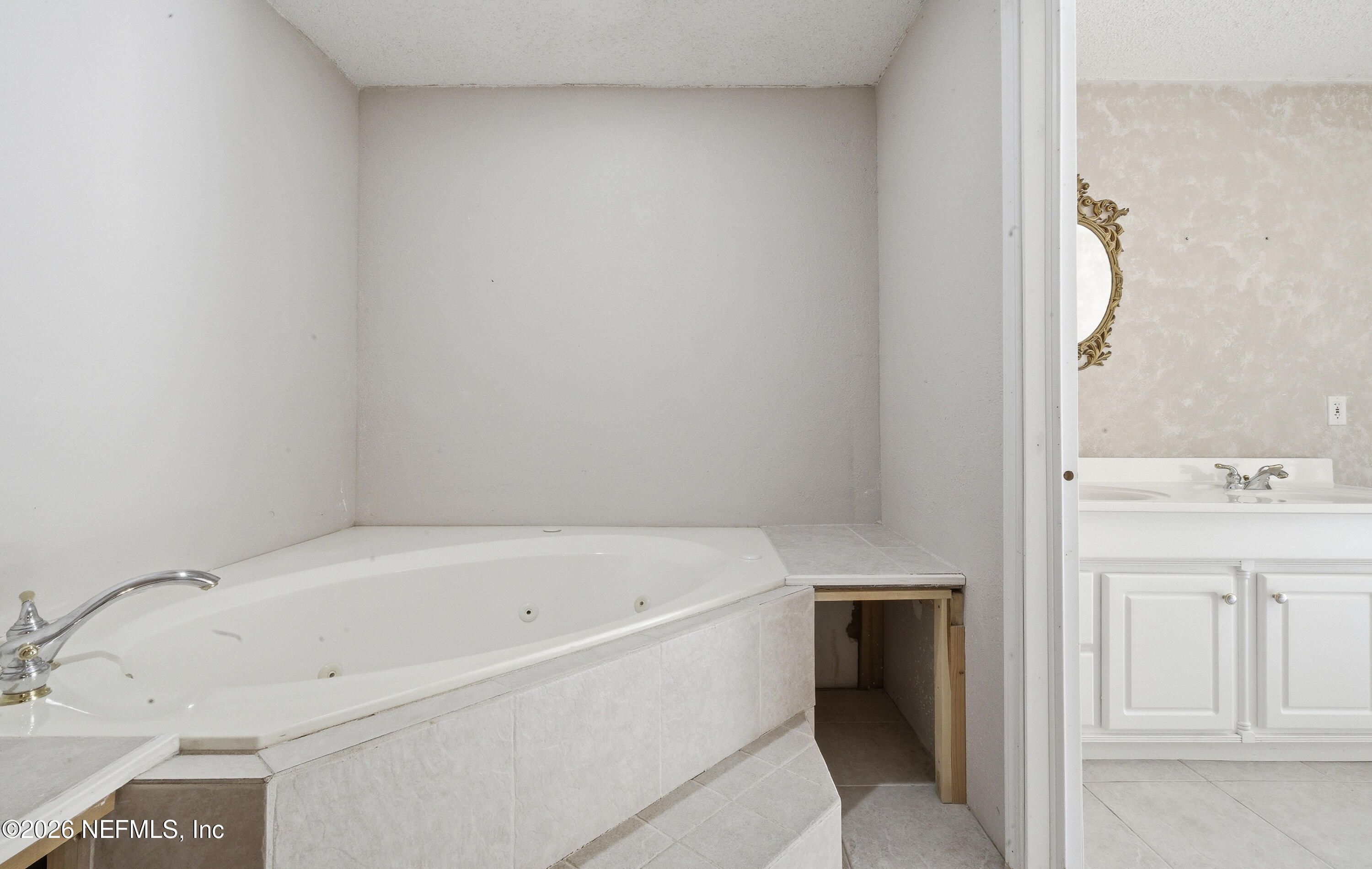 1722 Farm Way Middleburg, FL 32068 - Photo 20 of 37 a white bath tub sitting next to a white sink