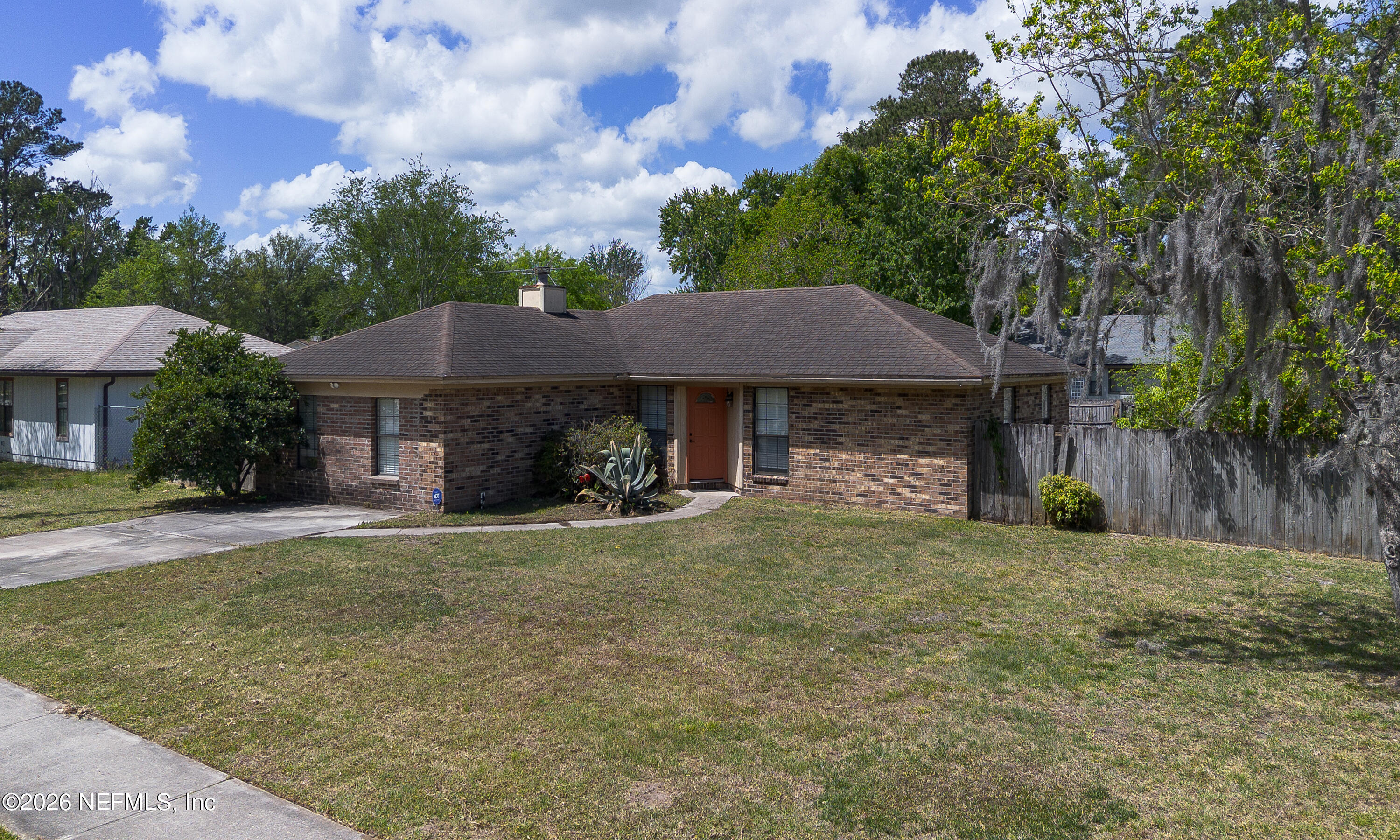 1722 Farm Way Middleburg, FL 32068 - Photo 6 of 37 a view of a house with a yard and tree s