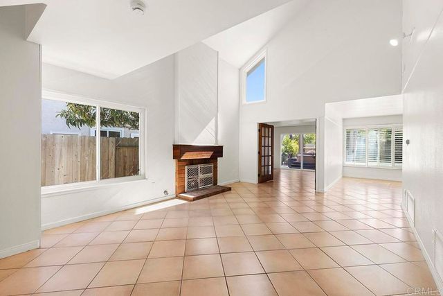 a kitchen with stainless steel appliances granite countertop a stove top oven a sink dishwasher and cabinets