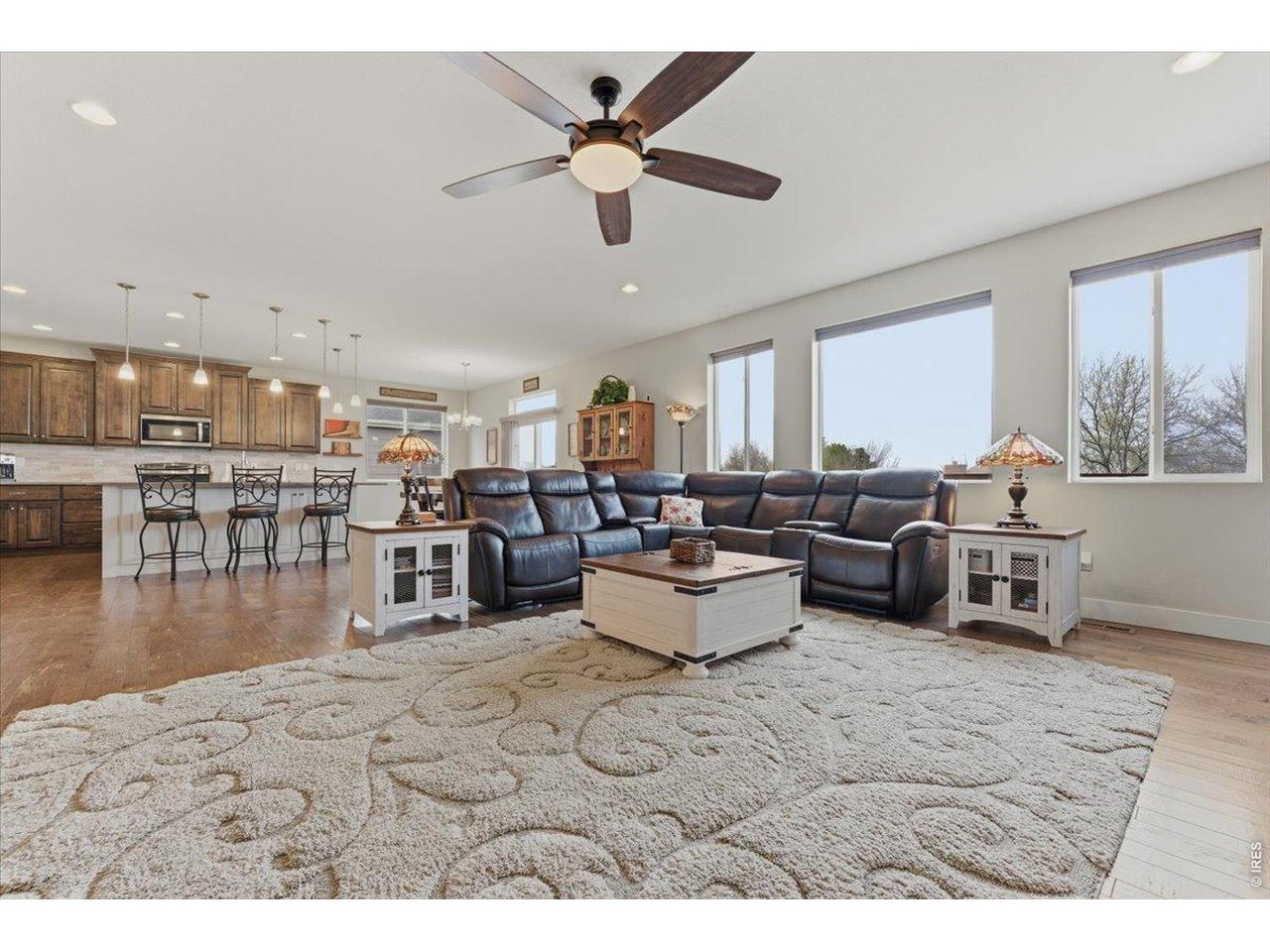 1148 Wagon Bend Road Berthoud, CO 80513 - Photo 12 of 50 Great room facing kitchen and dining area