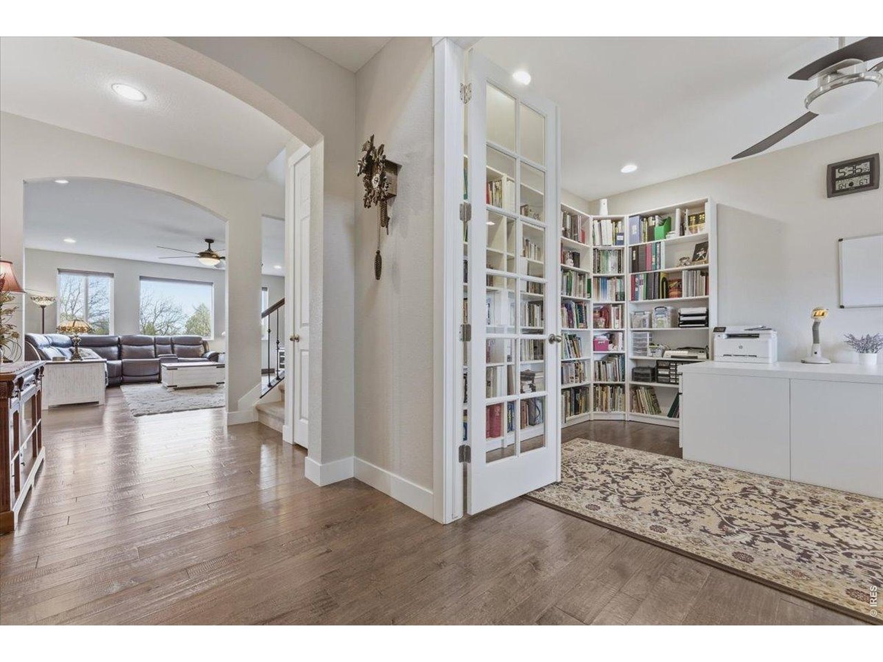 1148 Wagon Bend Road Berthoud, CO 80513 - Photo 7 of 50 Front door entrance looking at great room, stairs, study/office