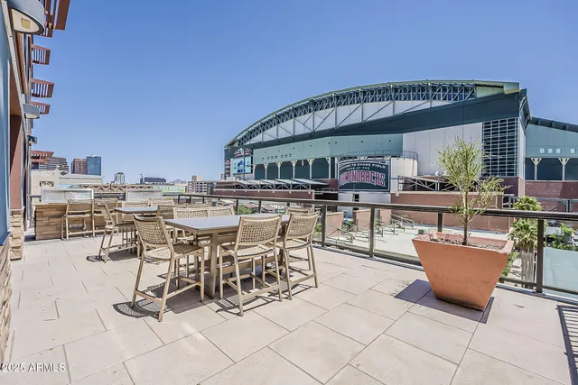 a view of a livingroom with furniture window and wooden floor