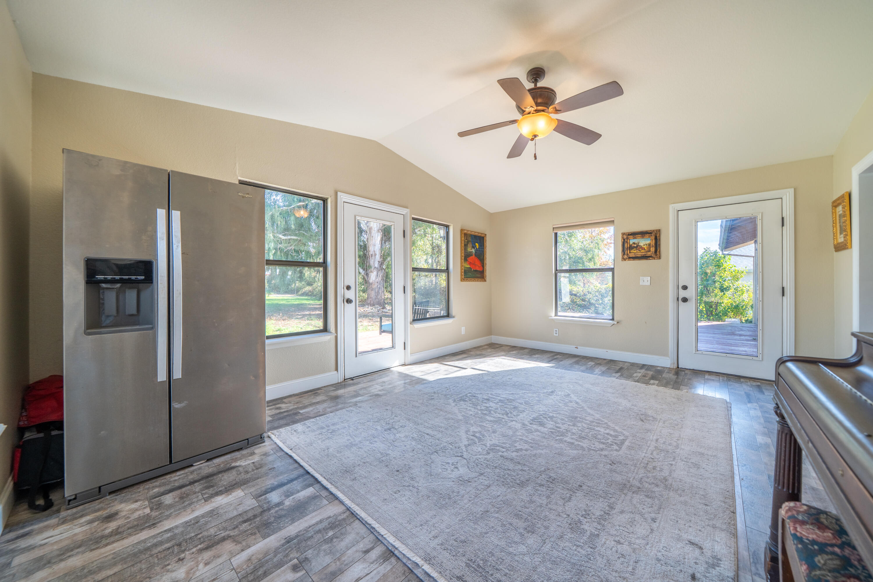7273 Amigo Way Redding, CA 96002 - Photo 18 of 59 a view of a livingroom with a ceiling fan and window
