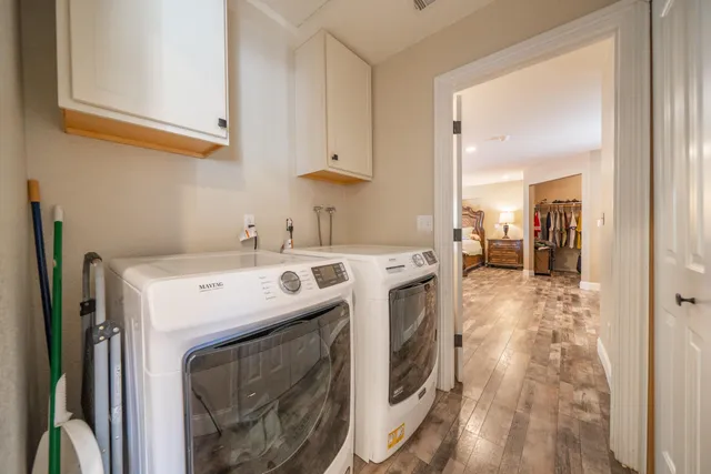 a spacious bedroom with a bed and a walk in closet
