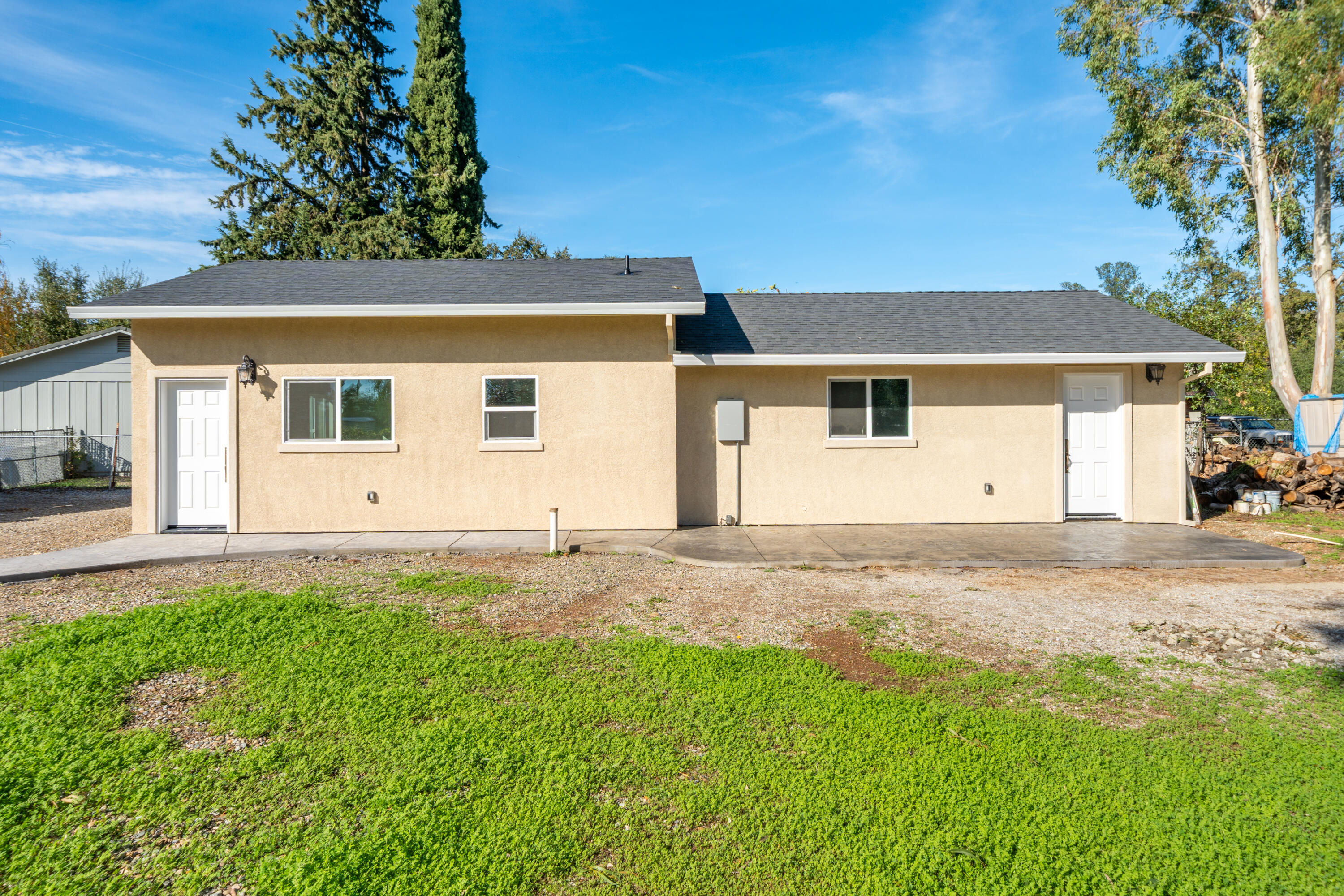 7273 Amigo Way Redding, CA 96002 - Photo 36 of 59 a view of a house with a yard