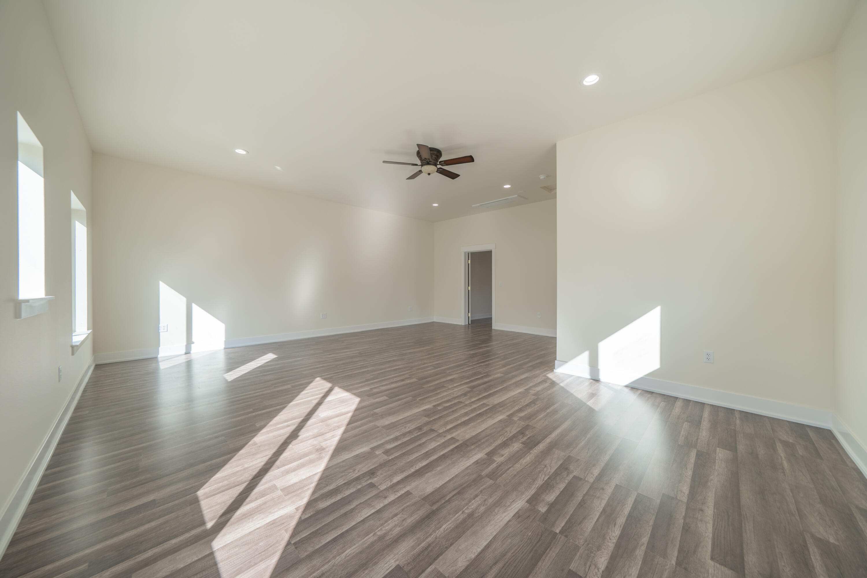7273 Amigo Way Redding, CA 96002 - Photo 37 of 59 a view of a room with wooden floor and an entryway