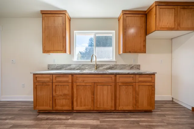 a view of a swimming pool with a yard