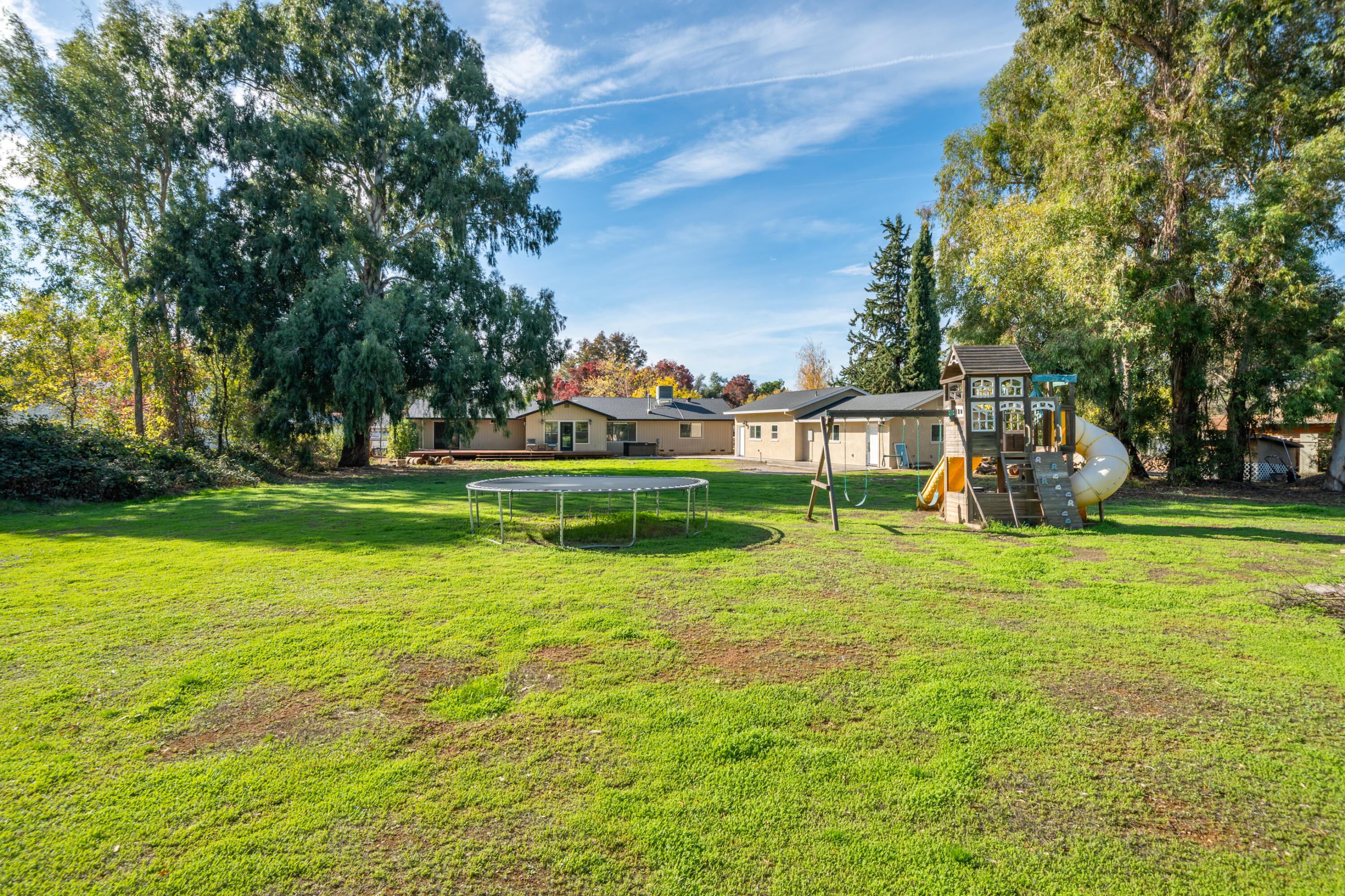 7273 Amigo Way Redding, CA 96002 - Photo 56 of 59 a view of a house with a big yard