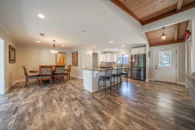 a living room with furniture and a table