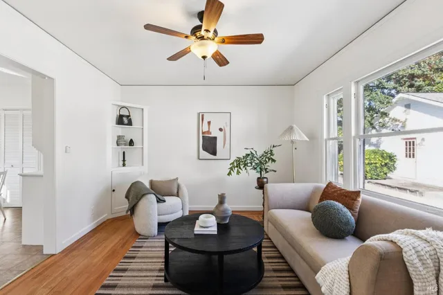 a kitchen with a stove cabinets and refrigerator