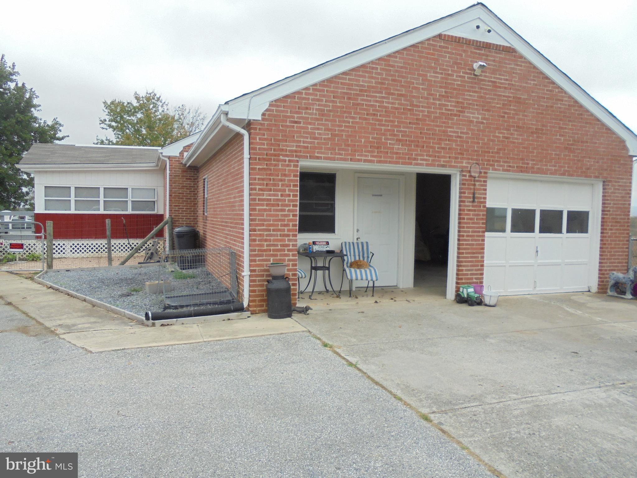 863 Cattail Run Road Charles Town, WV 25414 - Photo 22 of 30 Side - 1 Car attached Garage - Enclosed Porch