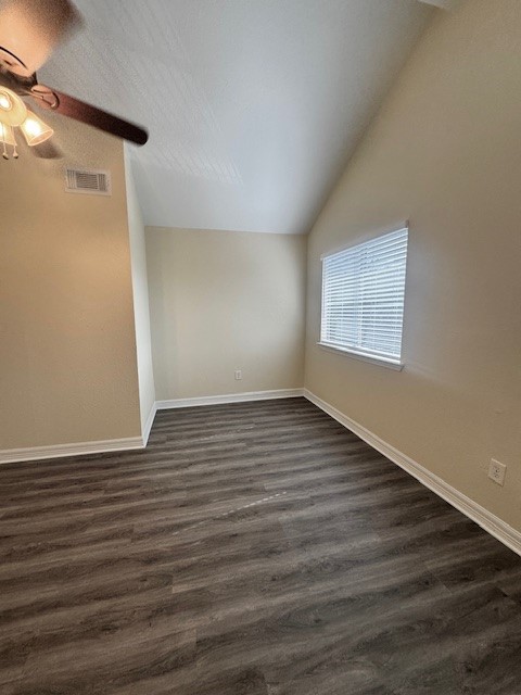 14020 Schroeder Road, Unit 151 Houston, TX 77070 - Photo 13 of 26 a view of an empty room with wooden floor and a window