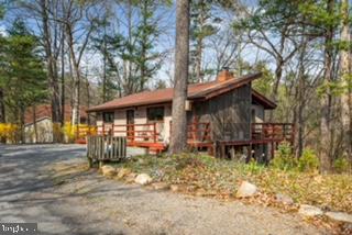 116 Palmer Road Basye, VA 22810 - Photo 2 of 28 Front deck and side screen porch