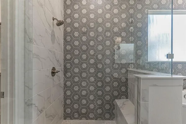 a bathroom with a double vanity sink mirror and double
