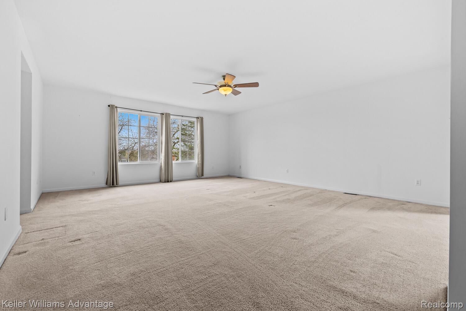 4100 Norwich Court Rochester, MI 48306 - Photo 31 of 72 Unfurnished room featuring light carpet and ceiling fan