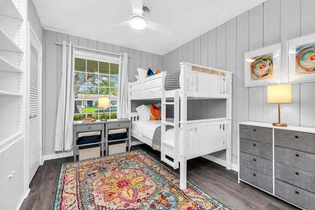 a bed room with a bed and a window