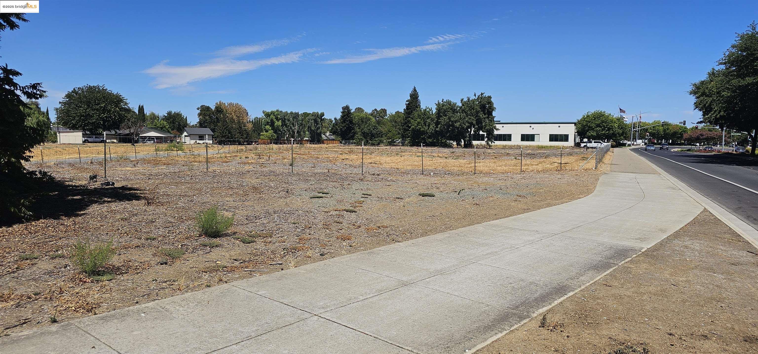 Creek Road Brentwood, CA 94513 - Photo 2 of 9 a view of the road and a yard