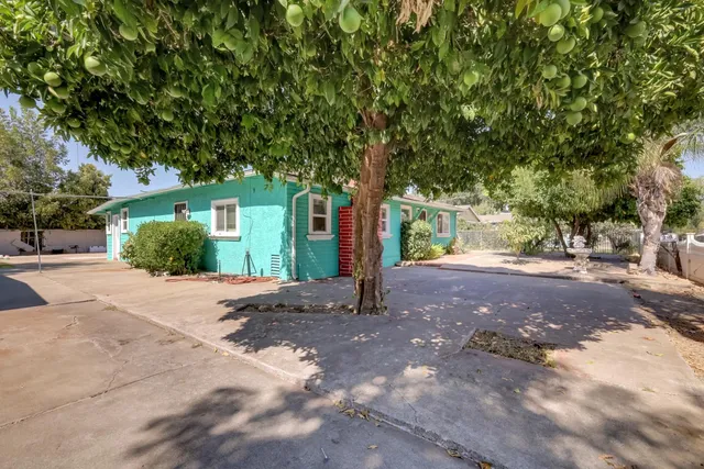 a view of a house with a street