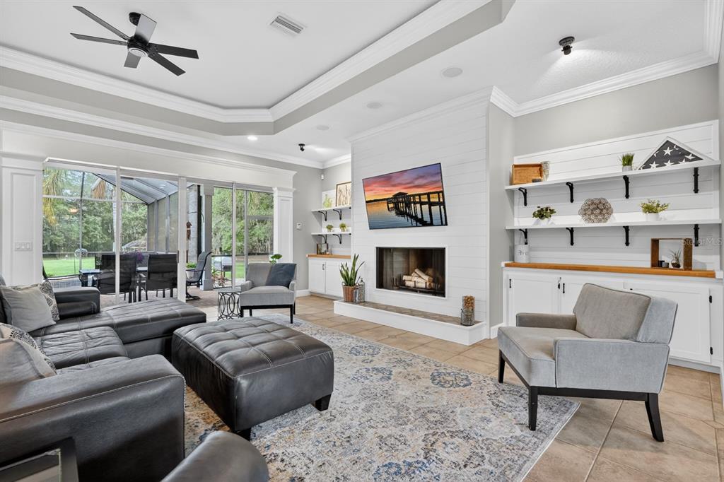 94 Smith Lane Bunnell, FL 32110 - Photo 20 of 80 a living room with furniture and a fireplace