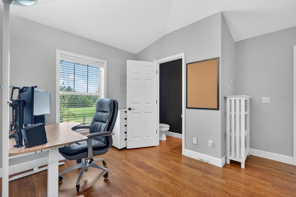 94 Smith Lane Bunnell, FL 32110 - Photo 50 of 80 a view of a workspace with furniture and a window