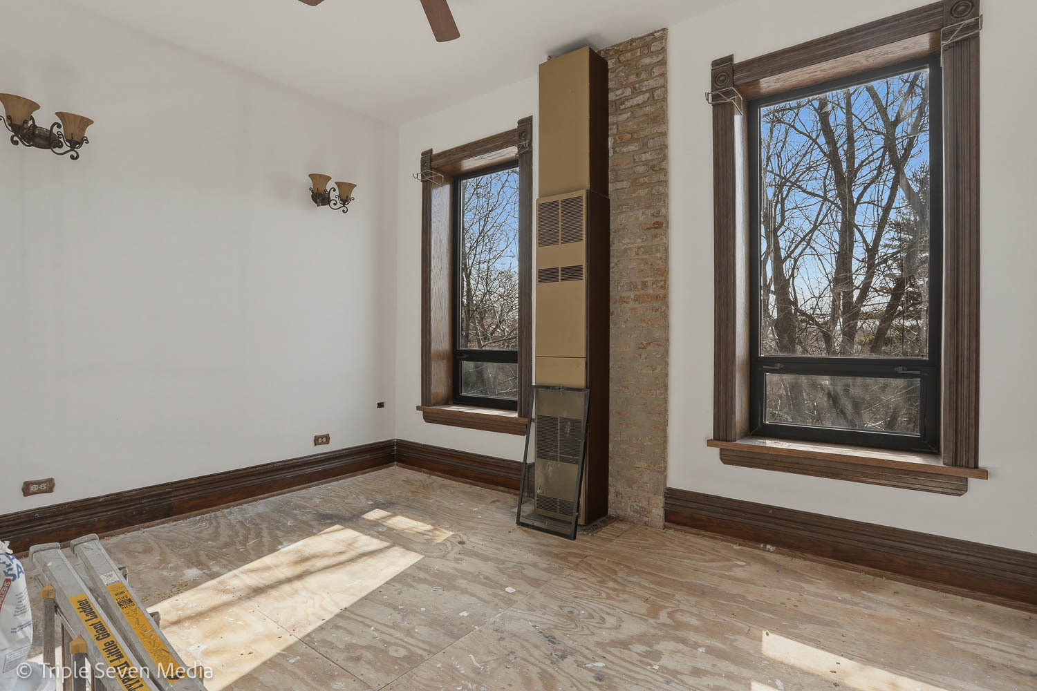 3315 South Wood Street Chicago, IL 60608 - Photo 41 of 80 a view of an empty room with a window and a fireplace