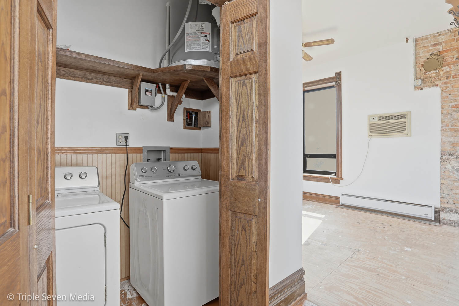 3315 South Wood Street Chicago, IL 60608 - Photo 43 of 80 a view of storage and utility room with washer and dryer