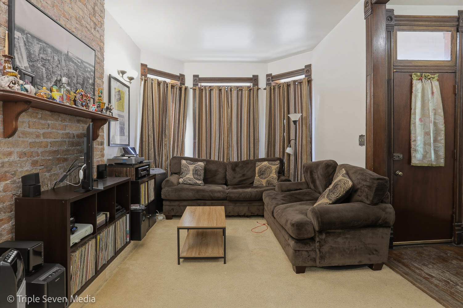 3315 South Wood Street Chicago, IL 60608 - Photo 50 of 80 a living room with furniture and a fireplace