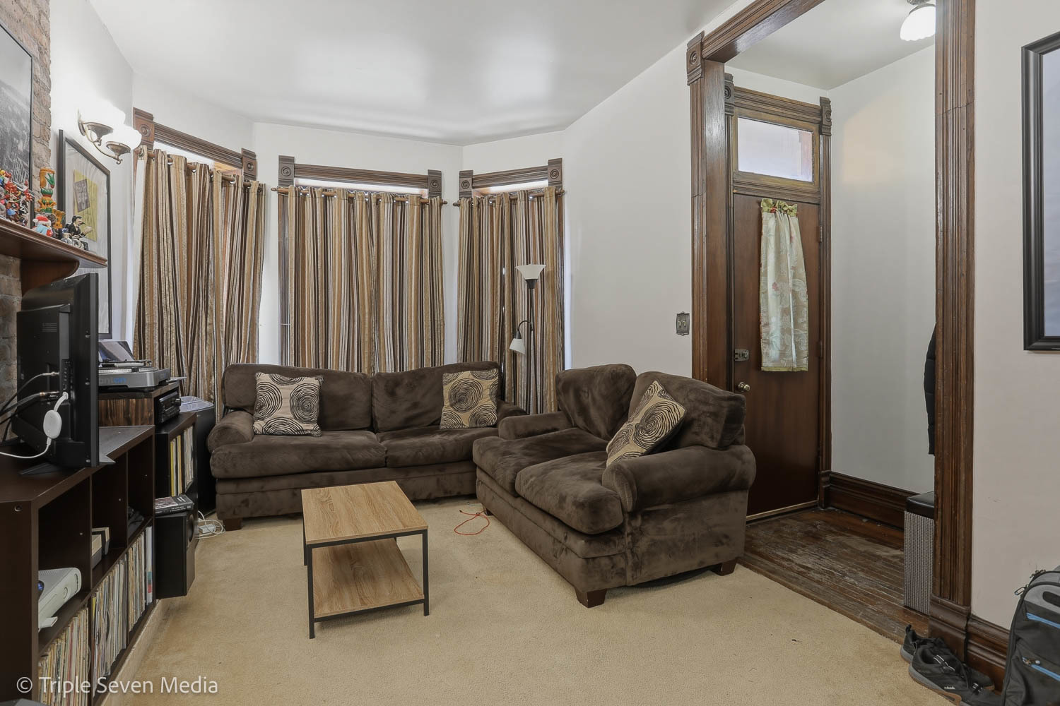 3315 South Wood Street Chicago, IL 60608 - Photo 51 of 80 a living room with furniture and a flat screen tv