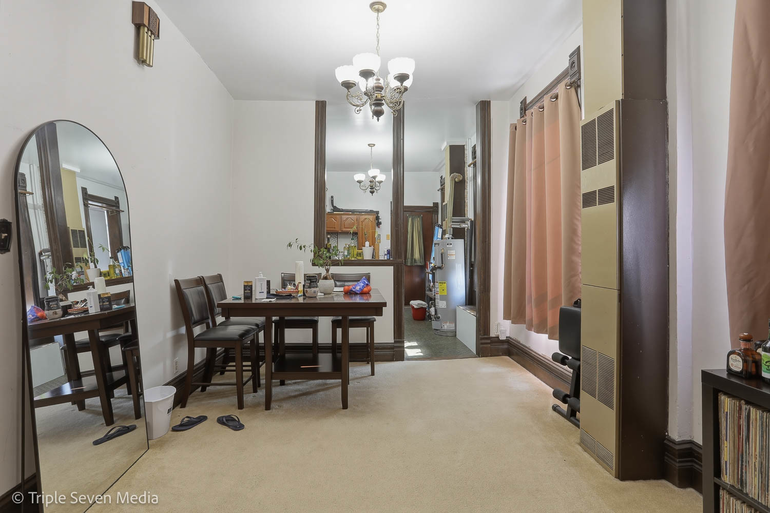 3315 South Wood Street Chicago, IL 60608 - Photo 54 of 80 a view of a dining room with furniture and chandelier