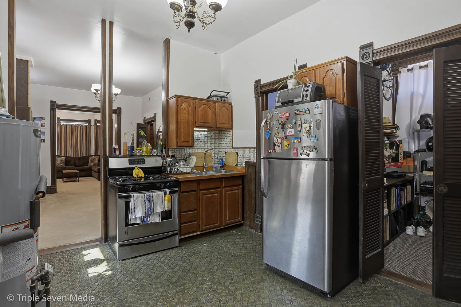 3315 South Wood Street Chicago, IL 60608 - Photo 58 of 80 a kitchen with stainless steel appliances granite countertop a refrigerator and a refrigerator