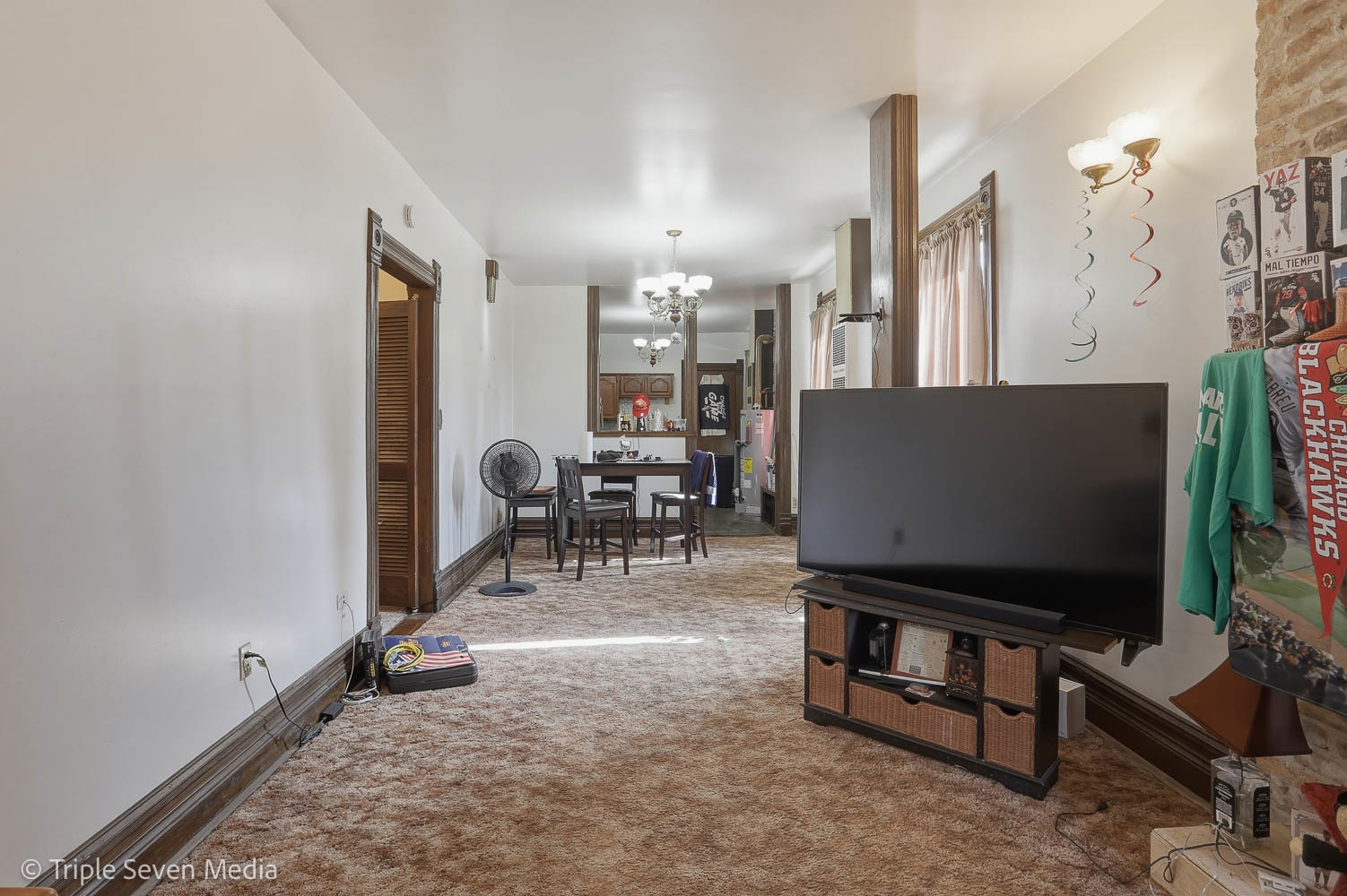 3315 South Wood Street Chicago, IL 60608 - Photo 75 of 80 a living room with furniture and a flat screen tv