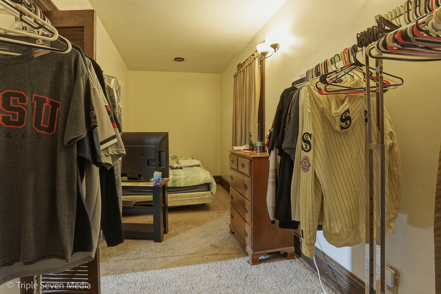 3315 South Wood Street Chicago, IL 60608 - Photo 77 of 80 a view of walk in closet with clothes