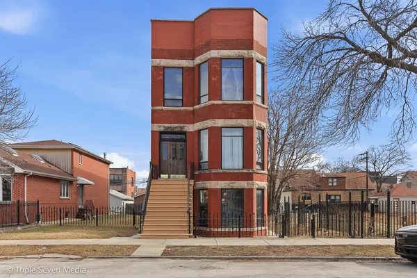 a view of a brick building from a balcony