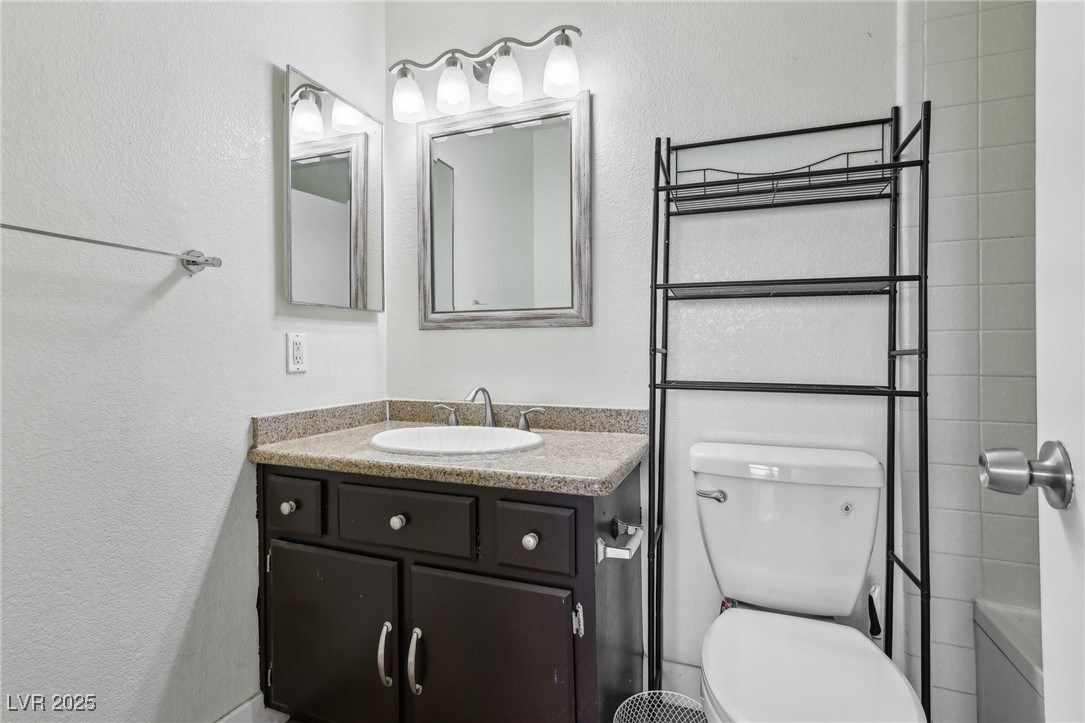 5241 South Lindell Road, Unit 202 Las Vegas, NV 89118 - Photo 24 of 35 Bathroom featuring vanity and toilet