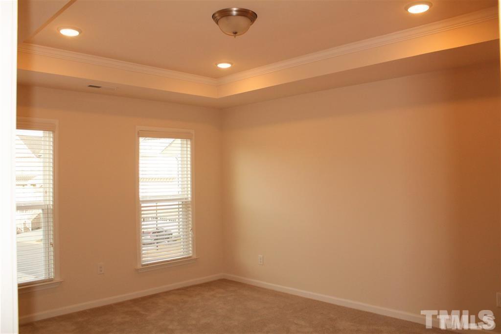 2102 Peakside Drive Apex, NC 27523 - Photo 10 of 21 a view of an empty room with a window