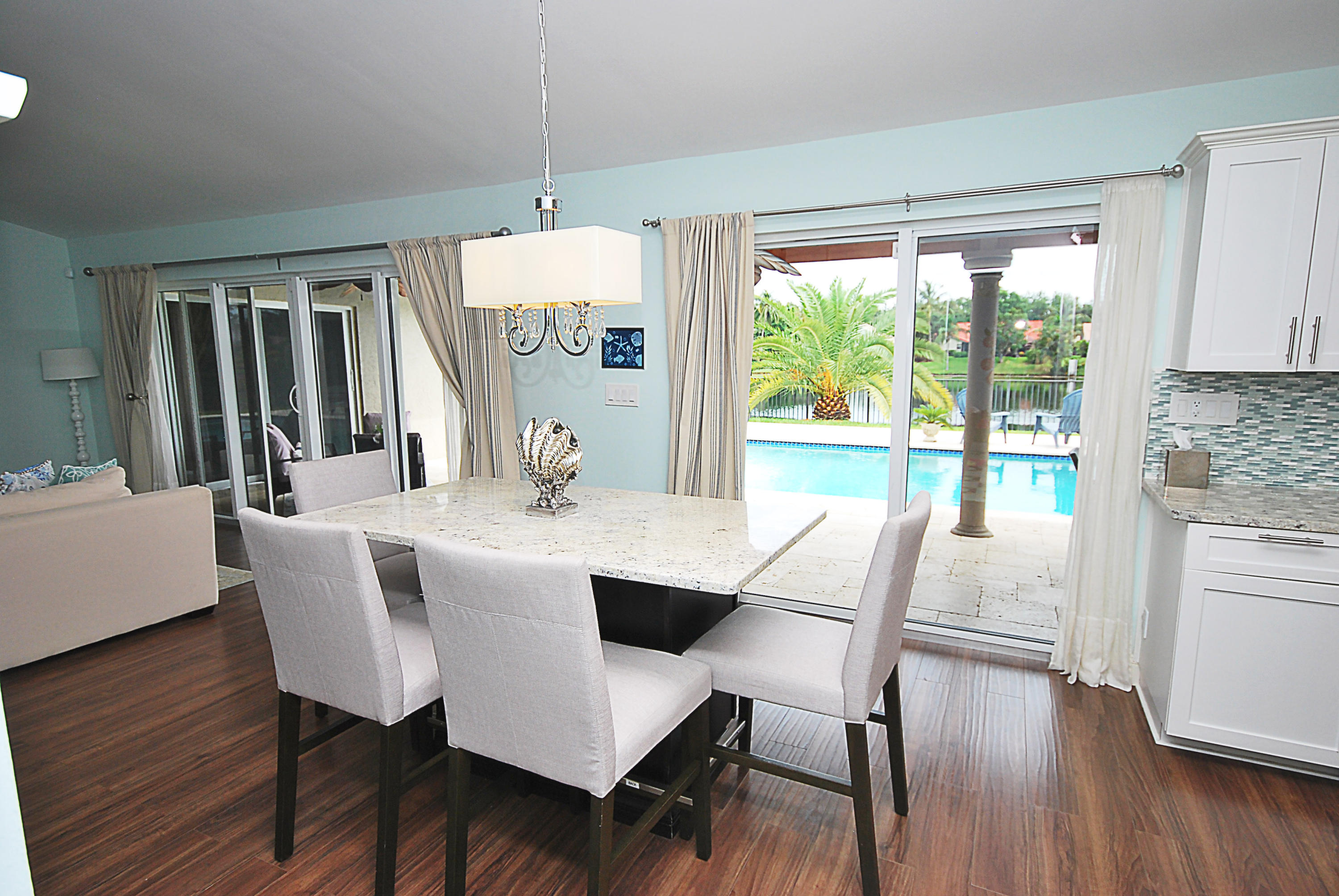 2621 Northwest 39th Street Boca Raton, FL 33434 - Photo 11 of 32 Kitchen Island / Pool and Lake View